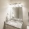 Large well lit bathroom with white accents 